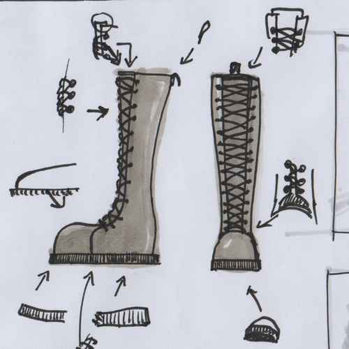 Two laced boots sketched with ink and marker, various parts are pointed to by arrows, at their base an alternative version of that part is sketched